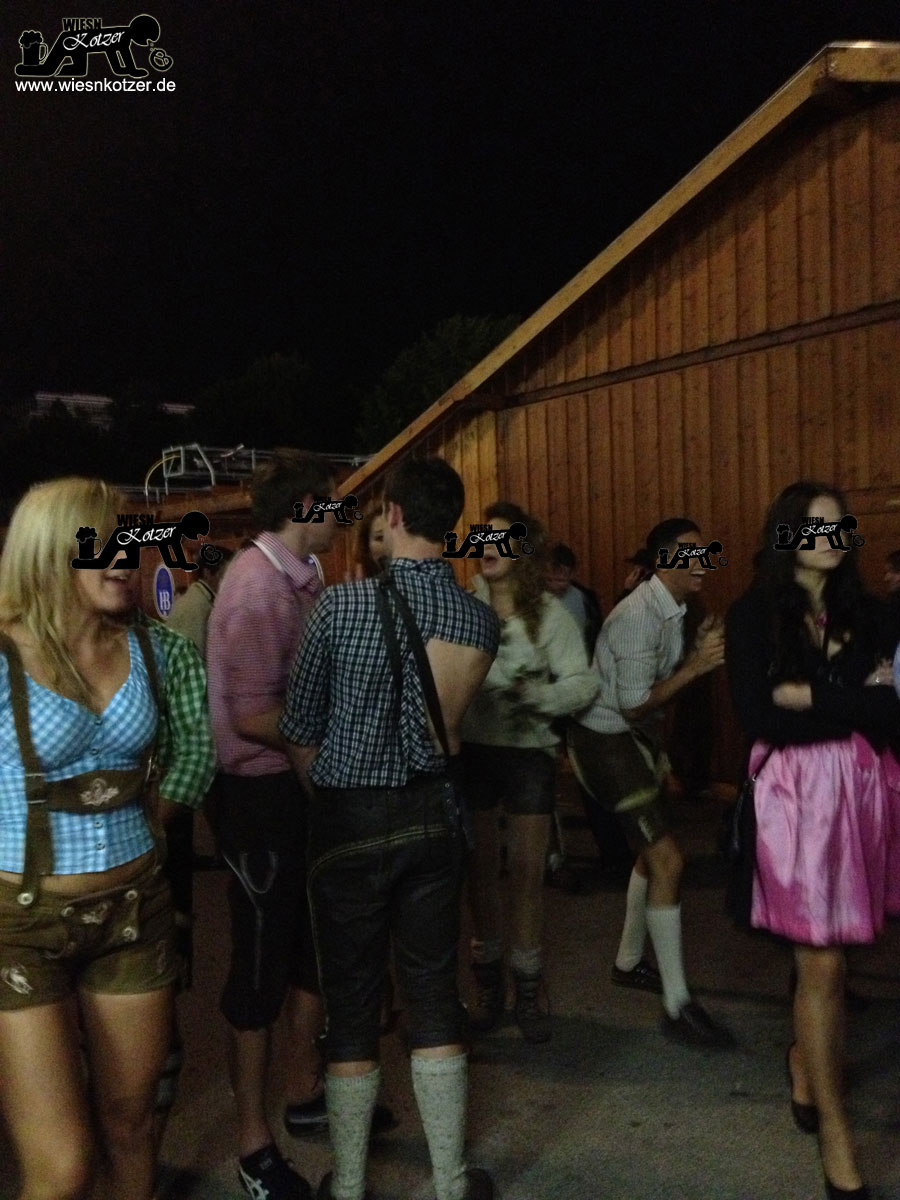 ripped shirt guy and sexy tummy shirt girl at the Oktoberfest