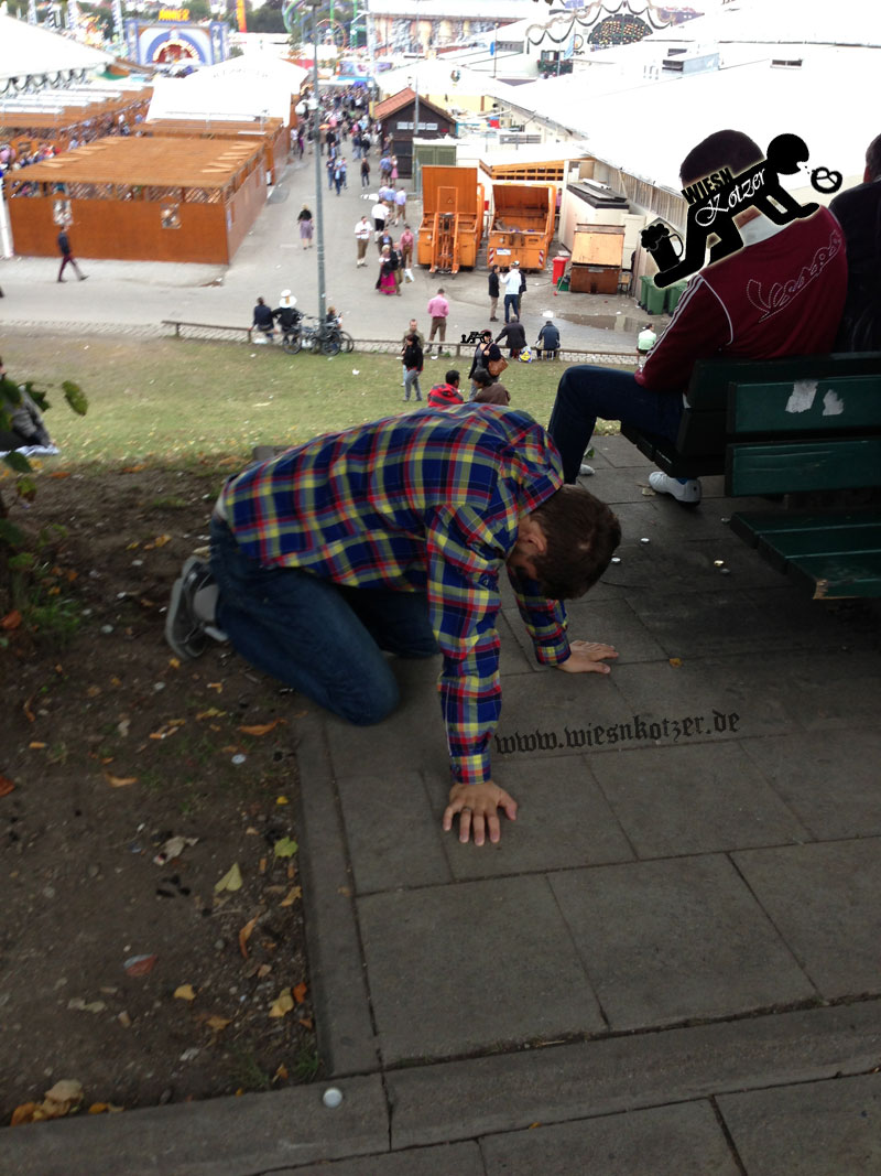 wasted guy in colorful shirt at the Oktoberfest 2012