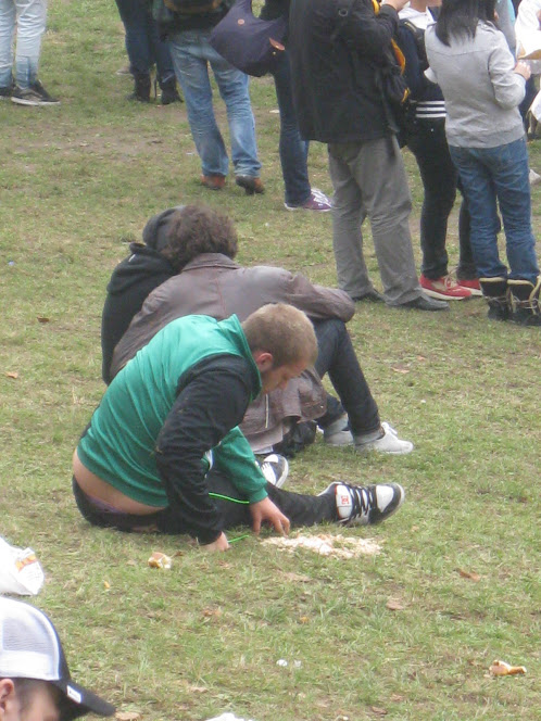 Guy in green shirt pukes a lake