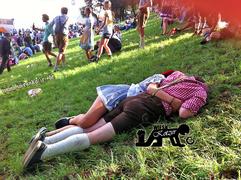 passed out couple sleeping at oktoberfest