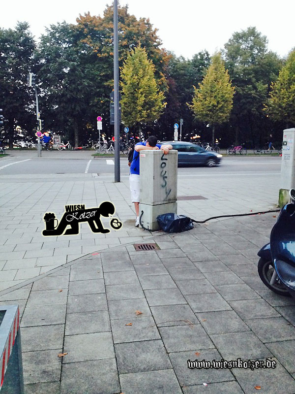 drunk guy sleeping on electric power box