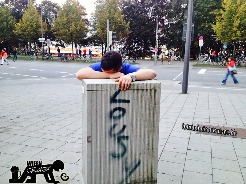 lousy drunk boy in front of oktoberfest